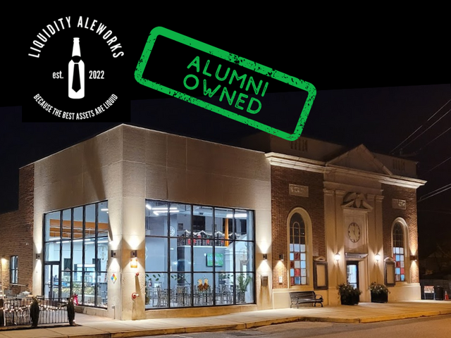 nighttime photo of Liquidity Aleworks building in Mt. Airy