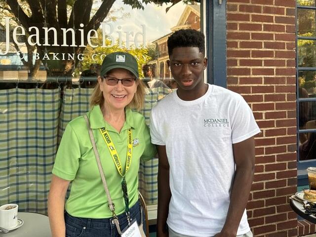 A McDaniel alum with a new student at JeannieBird Baking Co. on Main Street.