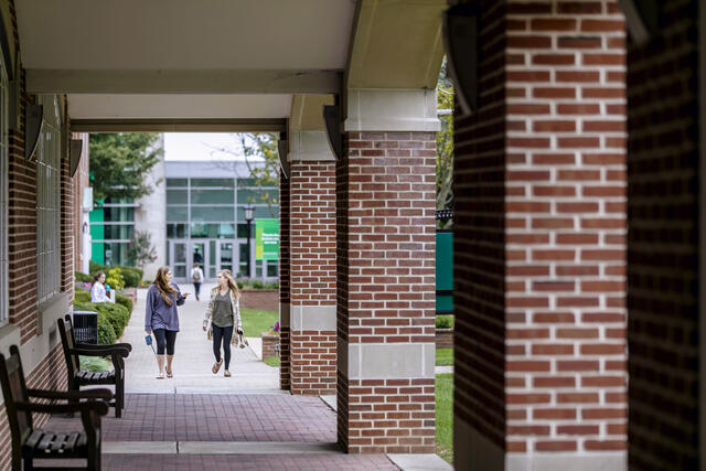 Students walking across campus.