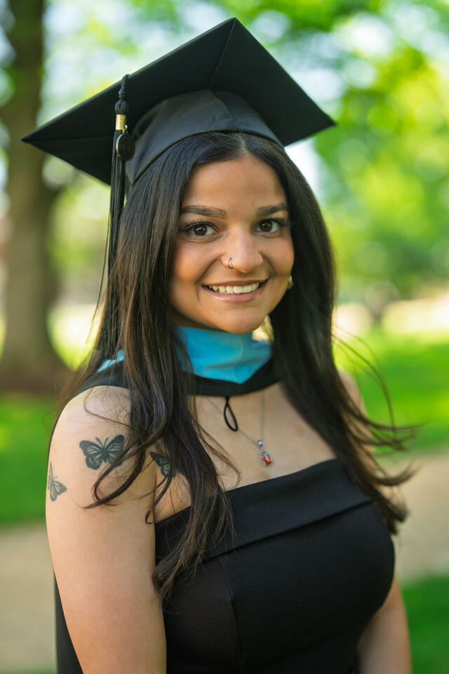 Ortiz, Yeseniah_Teaching in graduation regalia