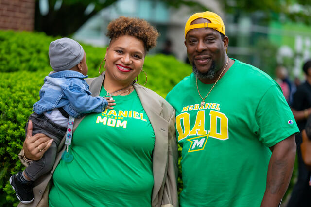McDaniel parents with a baby