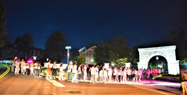 Picture of the McDaniel College Class of 2022 during the Candlelight walk. Photo credit: Lyndi McNulty.