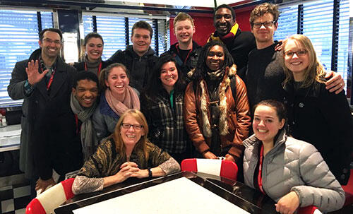 Peter Mark Kendall â08 (far right), a professional actor based in Manhattan, takes the opportunity to meet up with students and his former professor while helping to judge performances at the festival.