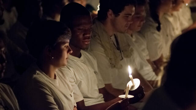 Candlelighting ceremony in Baker Memorial.