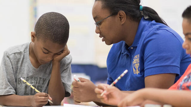 teacher with student