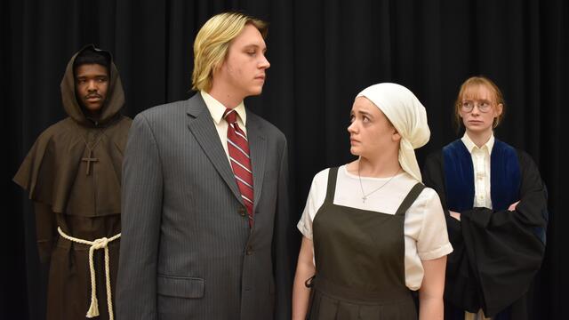 Reese Weaver of Brandywine, Md., as Duke Vincentio, Paul Steinert of Dundalk, Md., as Angelo, Danielle Carter of Rockville, Md., as Isabella, and May Riekenberg of South Orange, N.J., as Escalus, in McDaniel College Theatre’s production of "Measure for Measure."