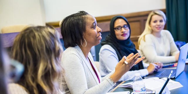 Grad students in classroom.